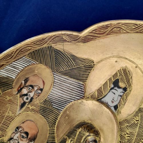 Close up crack to front - Japanese Satsuma Pottery Low relief Moulded Plate Painted Immortals or Lucky Gods with Halos marked Satsuma & Shimazu mon - Antique Meiji circa 1900