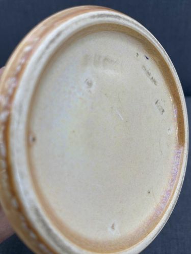 Angled base view showing the date mark for 1923
