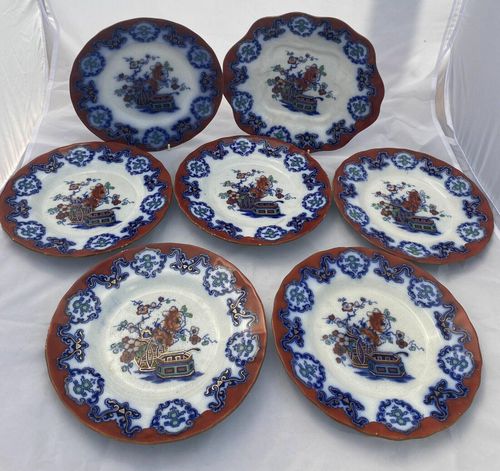 seven plates laid out