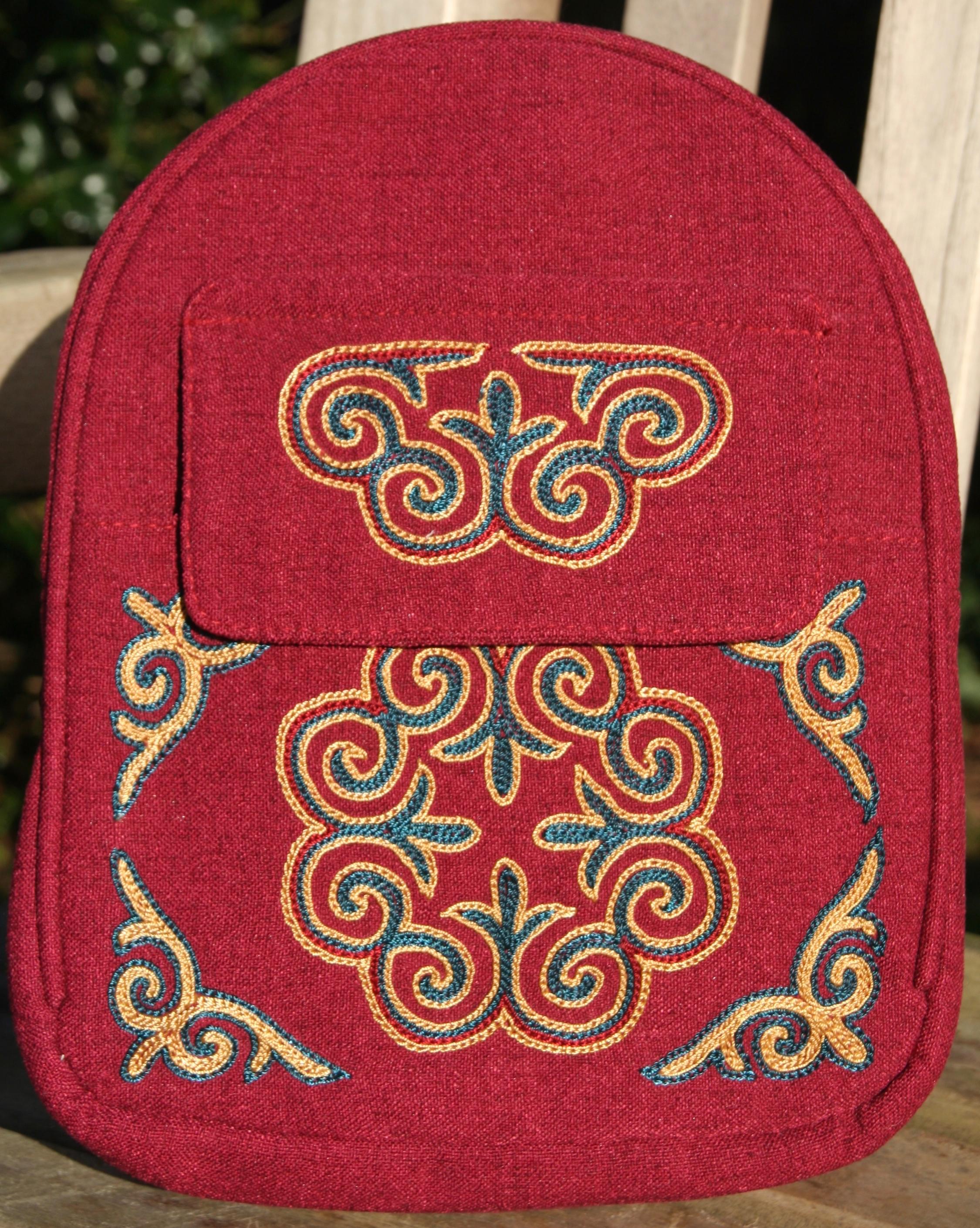 Fair-trade Handmade Mongolian mini backpack Red material Brown and Cream embroidery using traditional Kazakh motifs from East West Creative