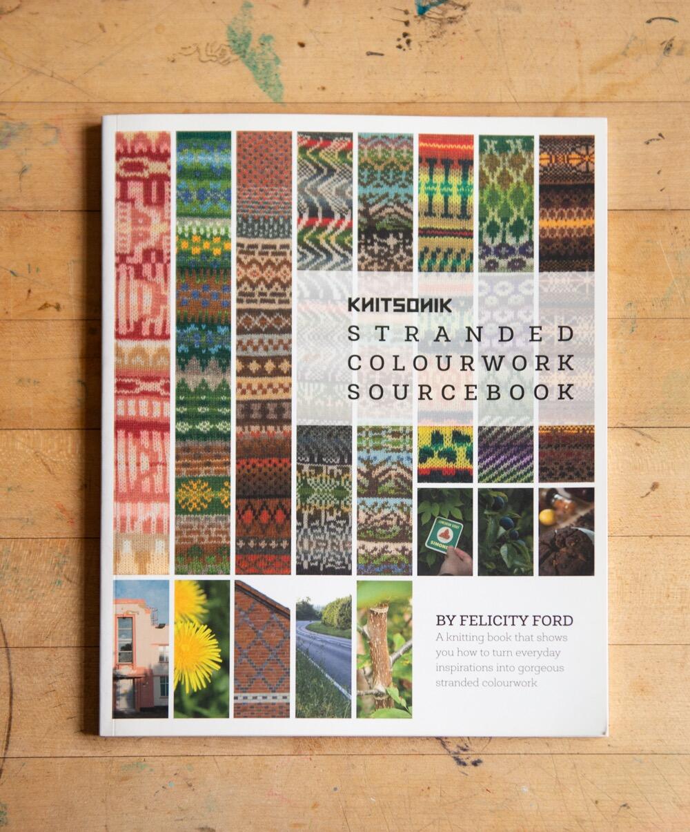 KNITSONIK Stranded Colourwork Sourcebook lying on a wooden table