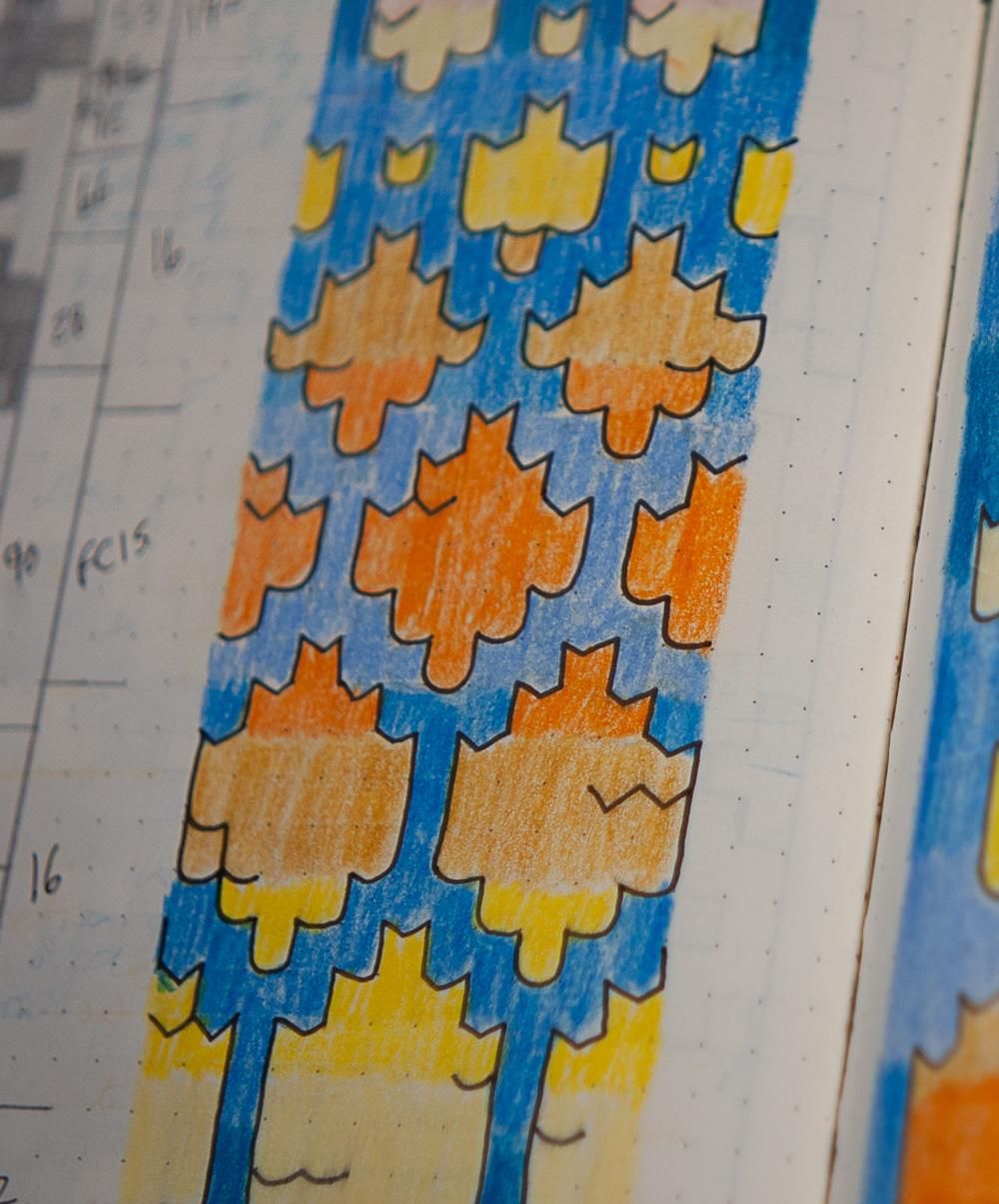 Closeup of stranded colourwork colouring-in detail from inside Bullet Journal