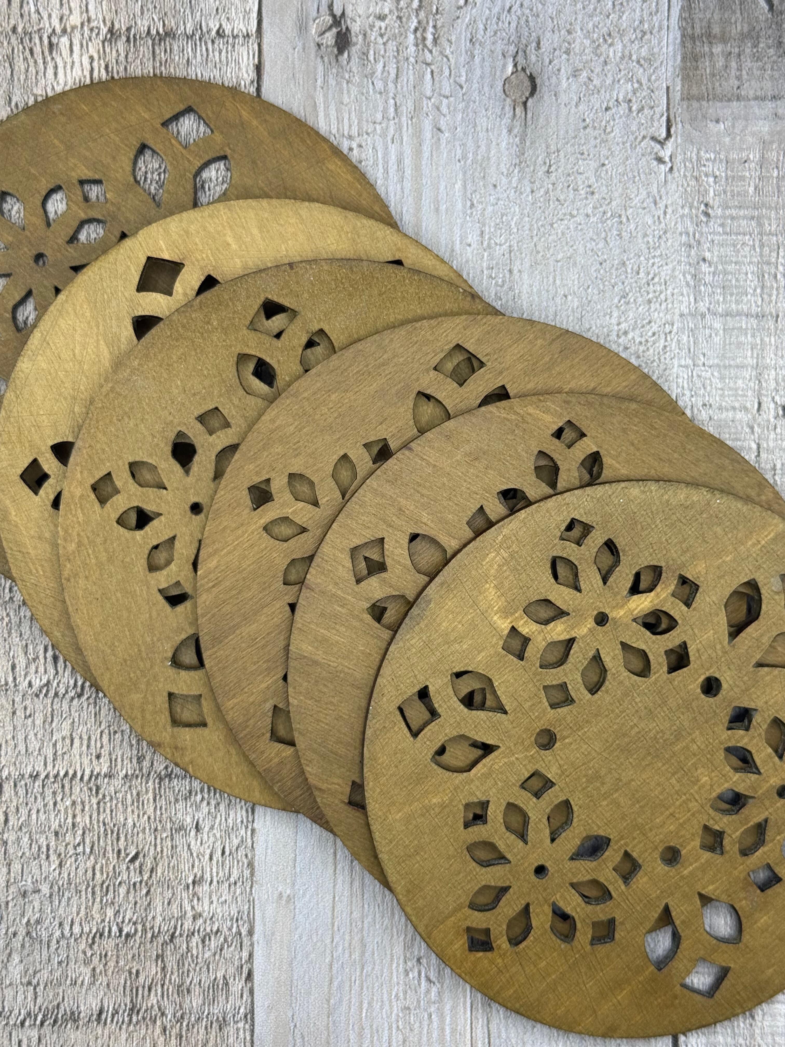 Laser cut wood drink coasters with intricate pattern