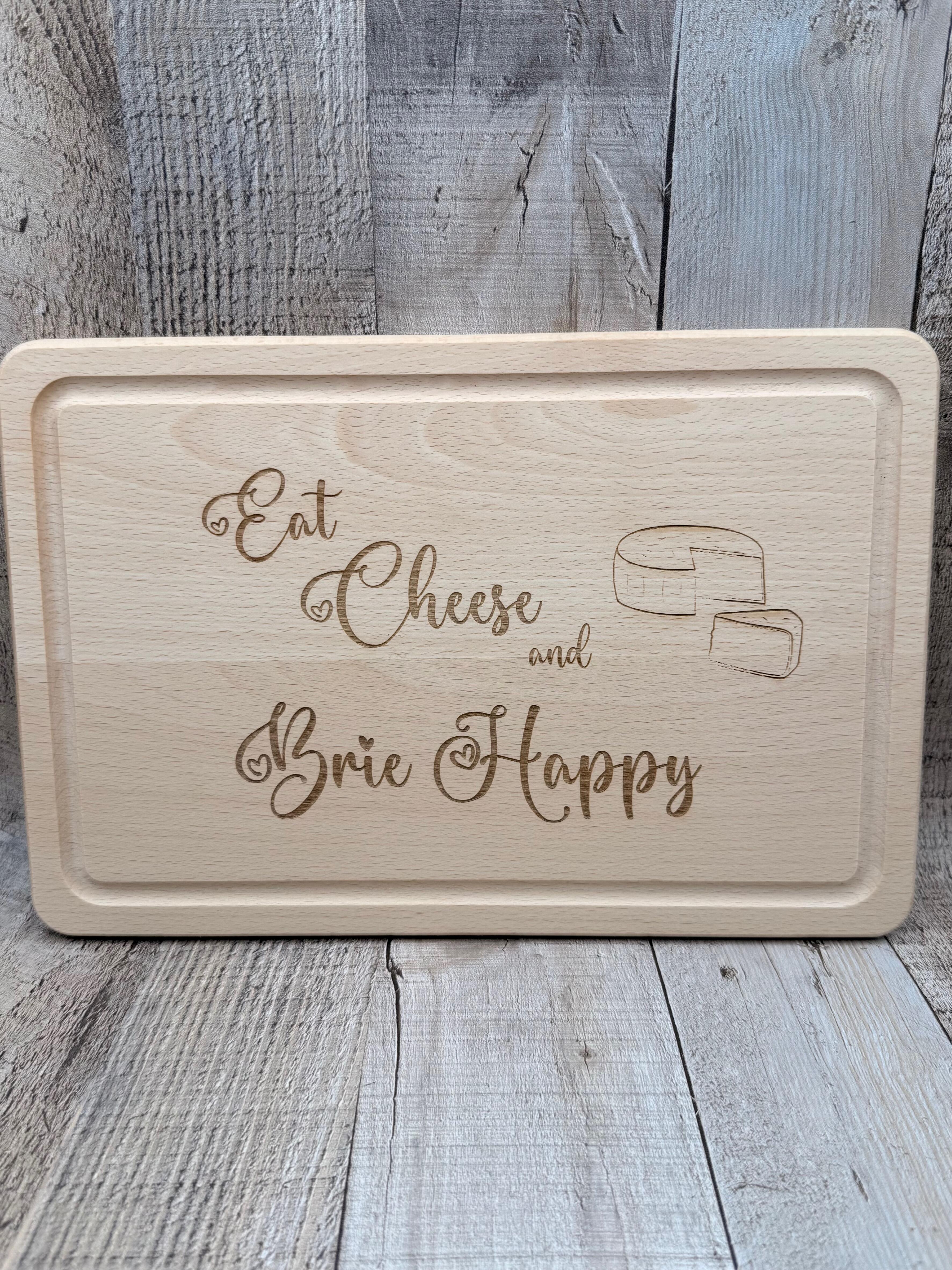 EAT CHEESE AND BRIE HAPPY LASER ENGRAVED BEECH CHOPPING BOARD