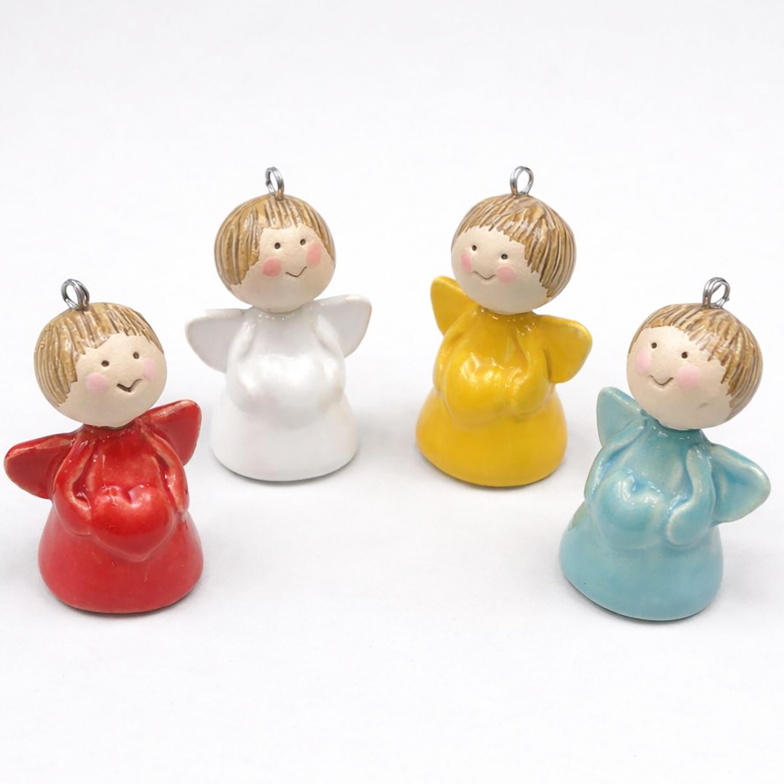 Charming handmade mini ceramic heart angels, perfect for hanging decor. Unique artisan ornaments that add warmth, love, and a delicate touch to any home or make a thoughtful gift.