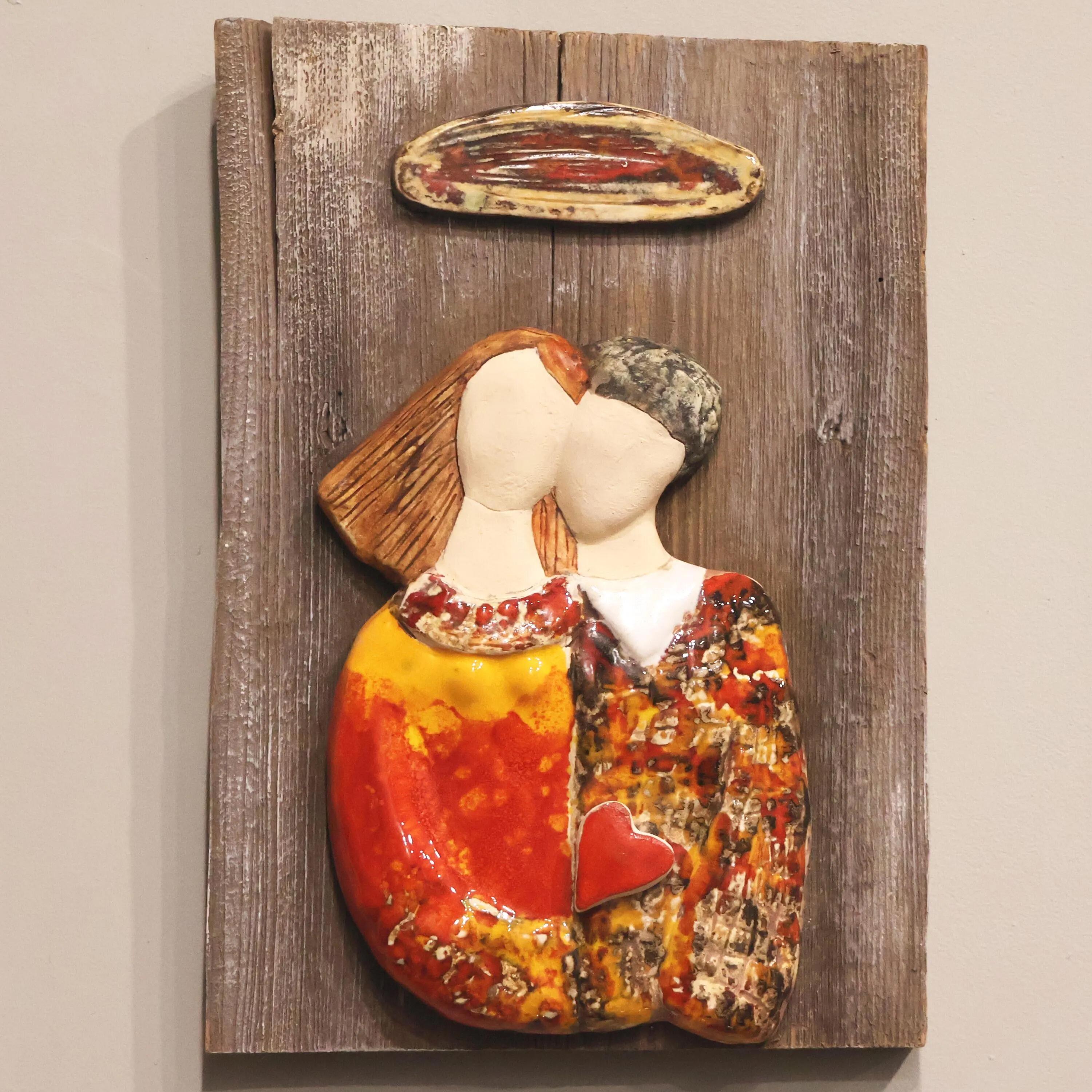 Handcrafted ceramic couple wall art with red heart on a vintage recycled wooden plaque. A unique wedding, anniversary, engagement, or couple gift with rustic charm.