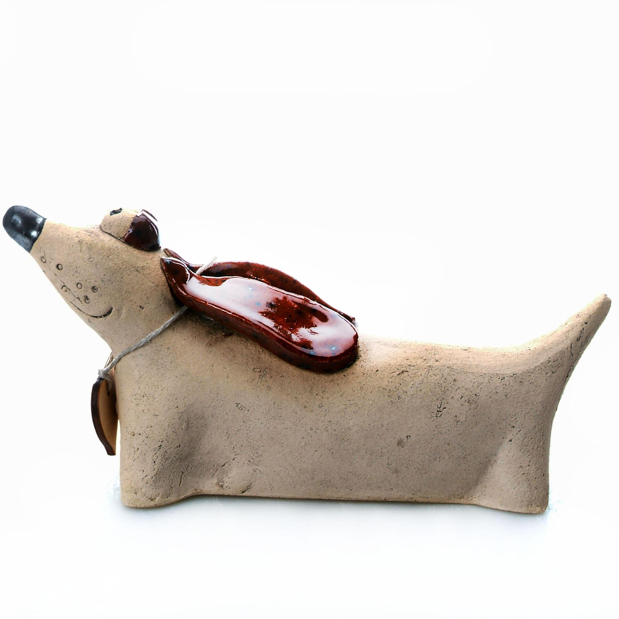 Handmade Ceramic Dachshund Figurine in various colours, crafted by skilled artisans, featuring a sleek and elegant design, perfect for home decor.