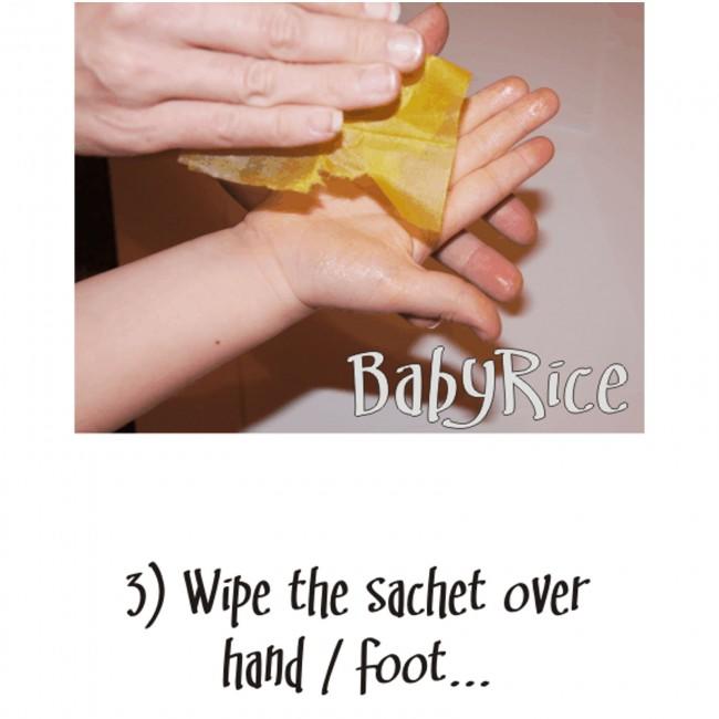 Wipe the inkless wipe over the hand or foot