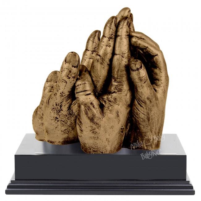 BabyRice Family Hand Cast in Metallic Bronze on Display Plinth