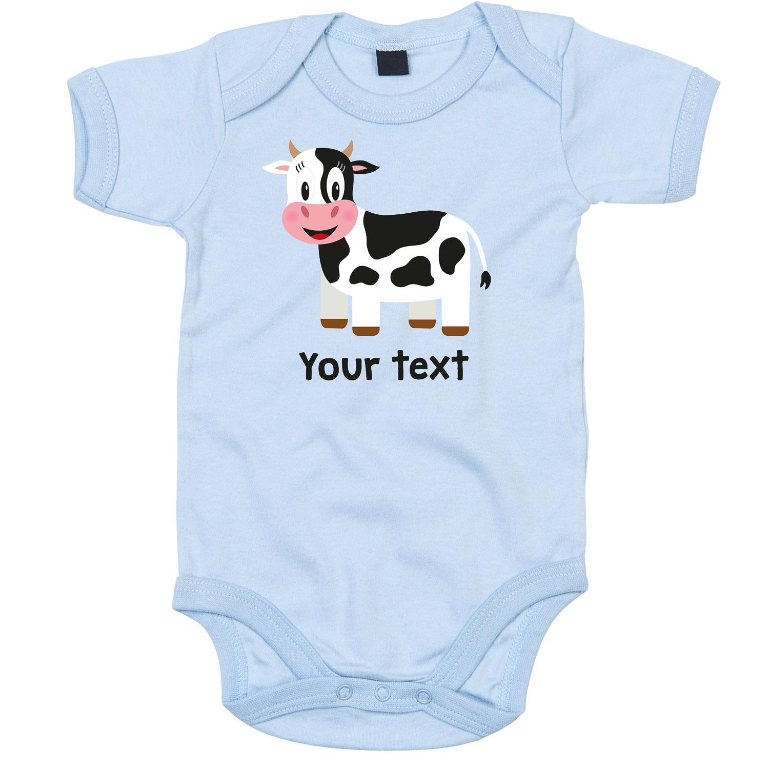 Anismalls cow character on a dusty blue coloured personalised bodysuit