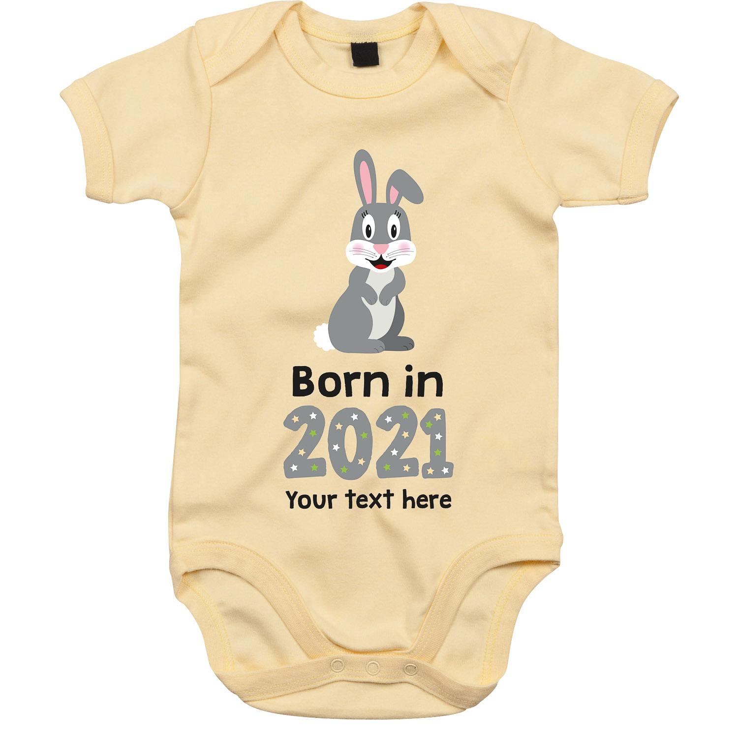 Anismalls rabbit character on a soft yellow coloured personalised bodysuit with born in 2021 text in grey