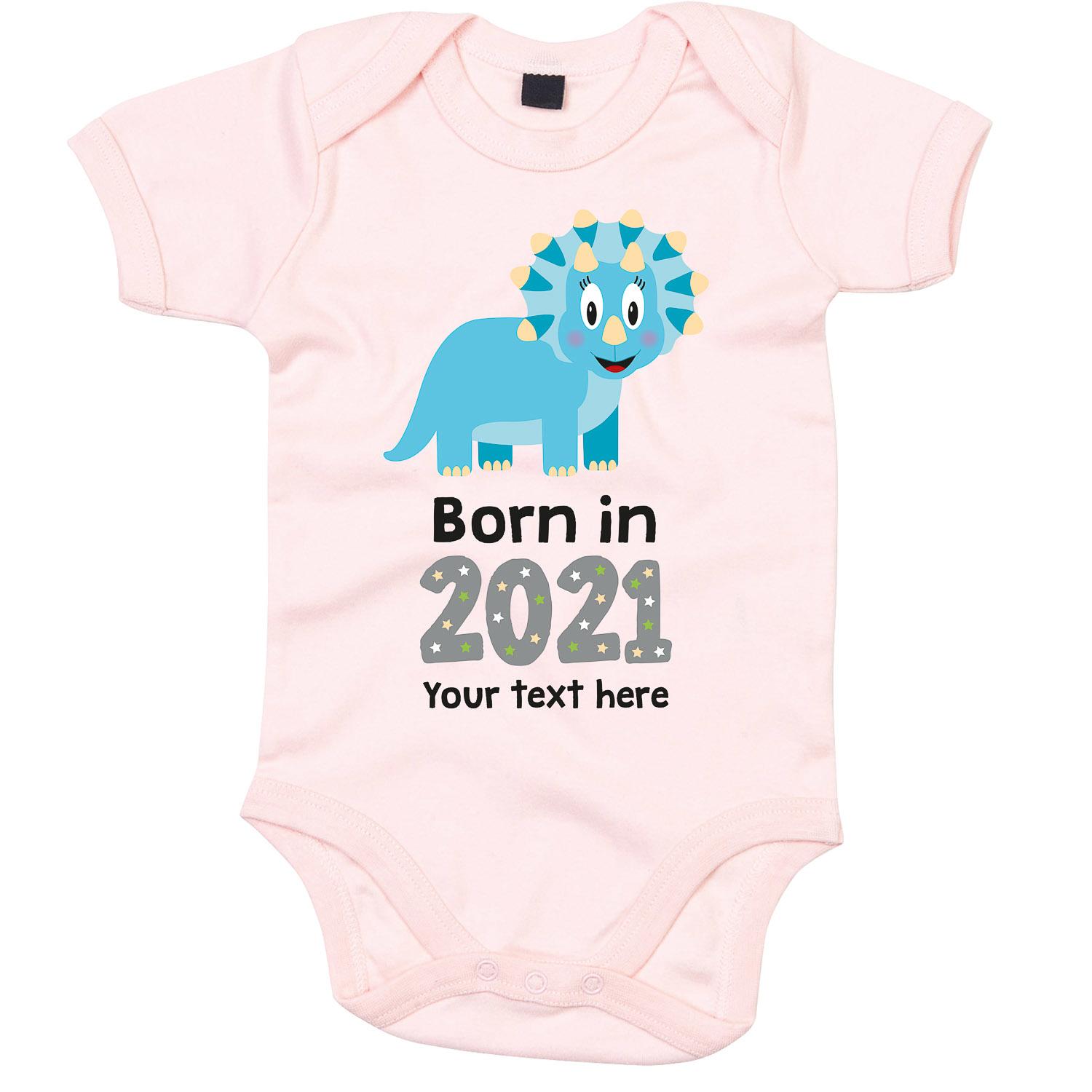 Anismalls Triceratops dinosaur character on a powder pink coloured personalised bodysuit with born in 2021 text in grey