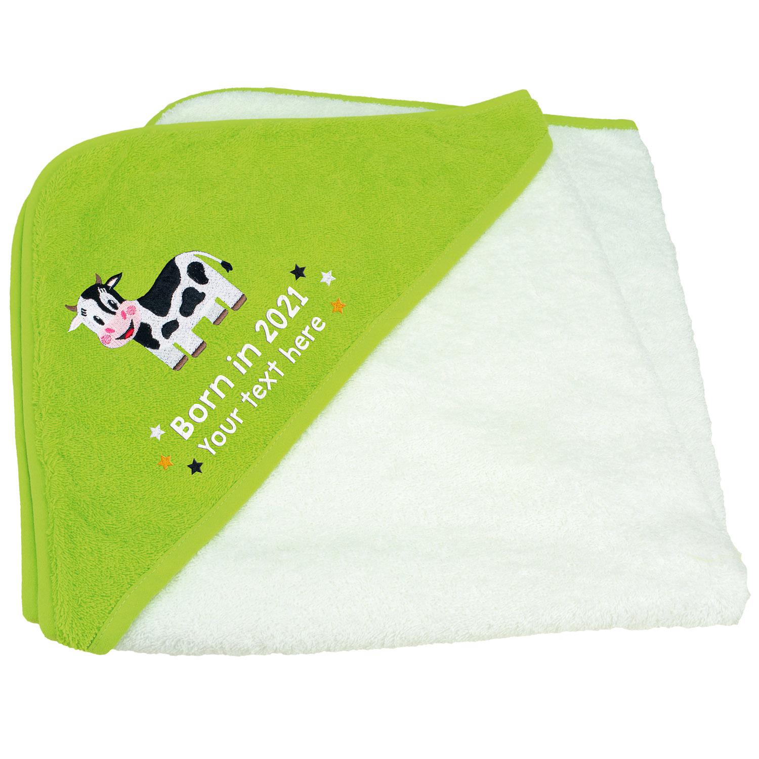 Anismalls cow character on a white towel with a Lime Green coloured hood with born in 2021 text in white