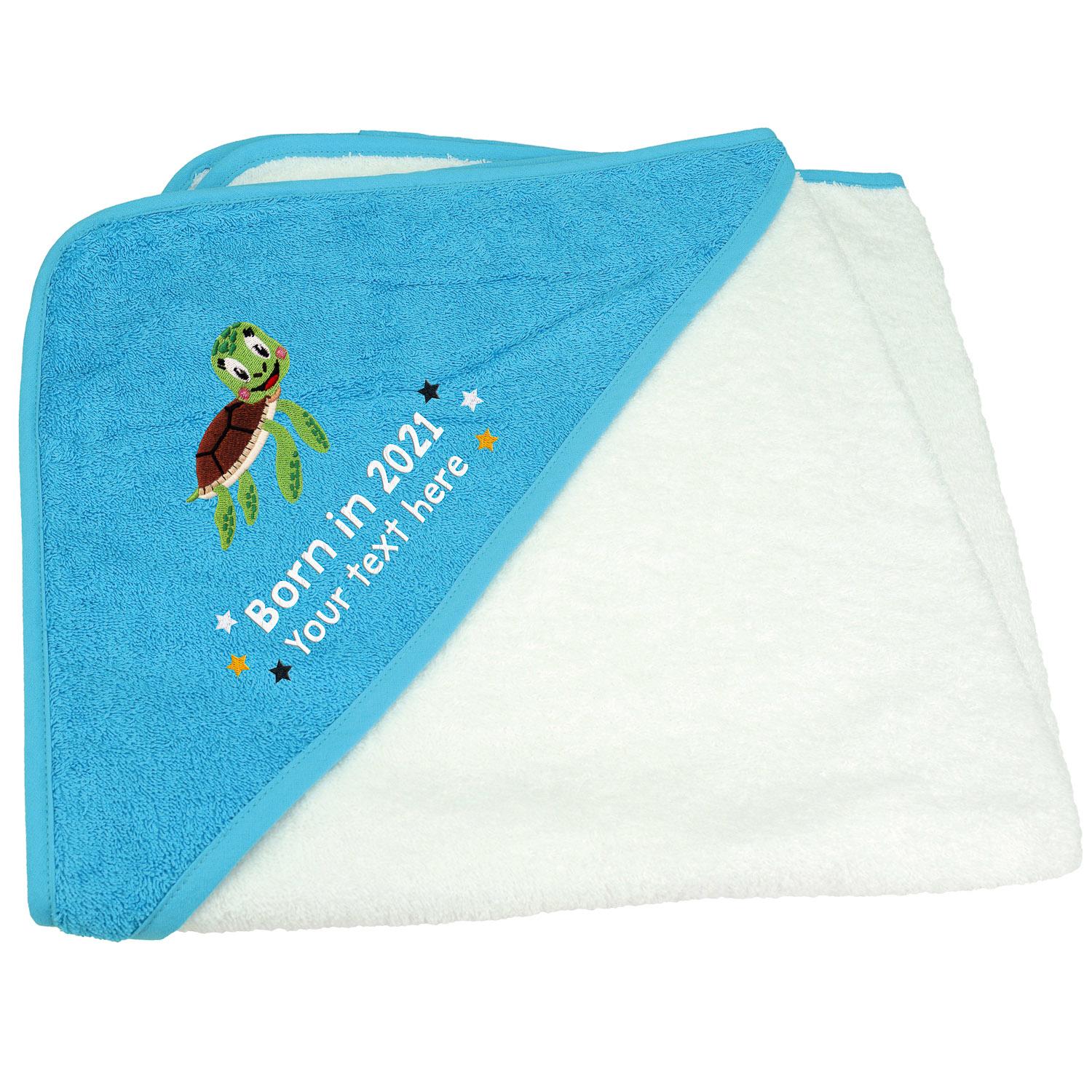 Anismalls sea turtle character on a white towel with a Aqua Blue coloured hood with born in 2021 text in white