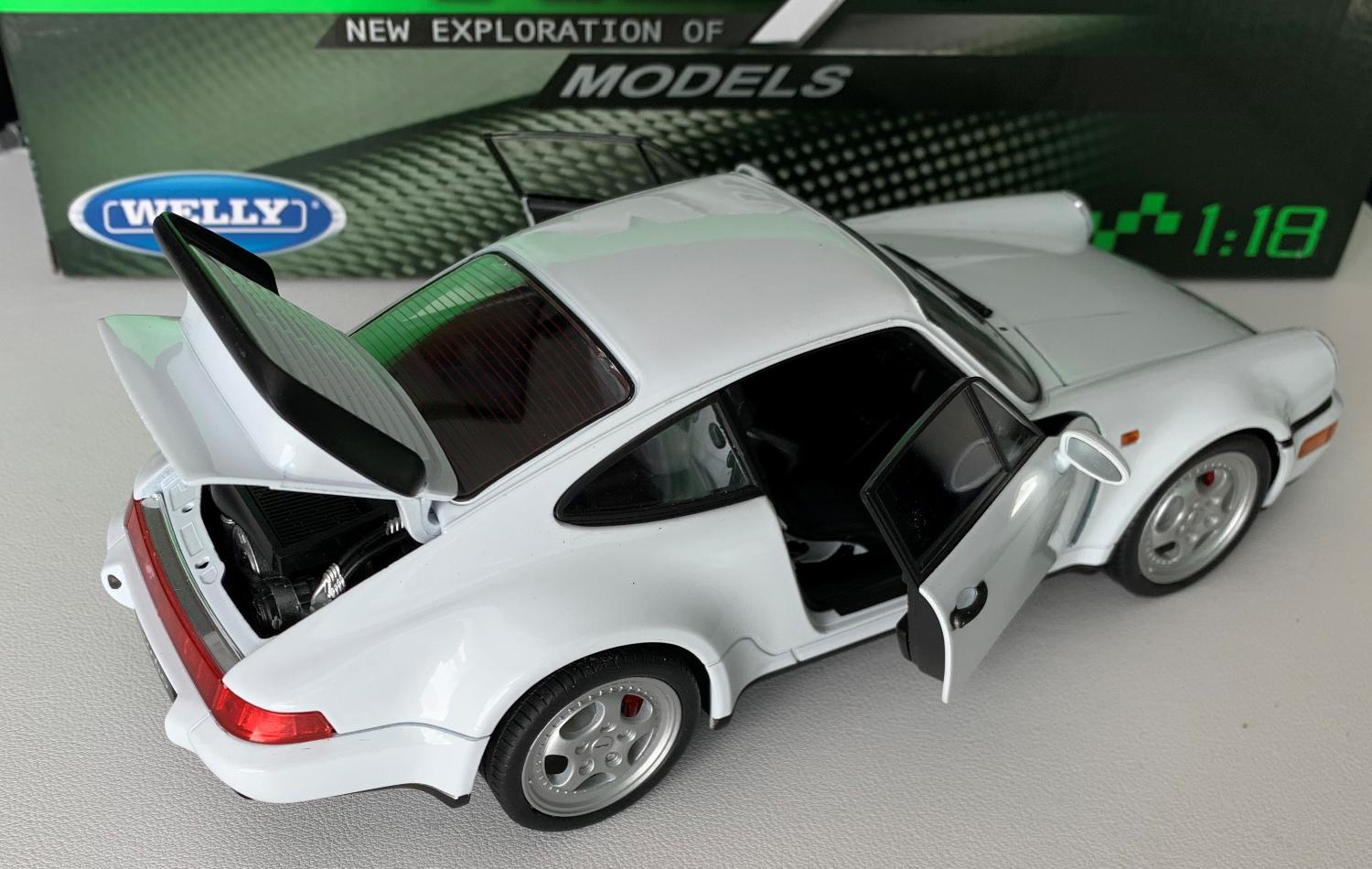 An excellent scale model of a Porsche 911 (964) Turbo decorated in white with silver wheels