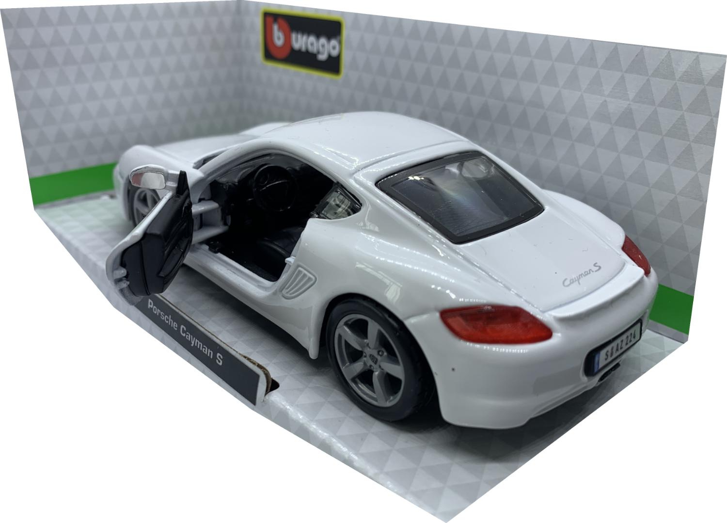 The Porsche Cayman S is decorated in which with silver wheels.  Other trims are finished in black and silver.  Features include opening driver and passenger door with working wheels.