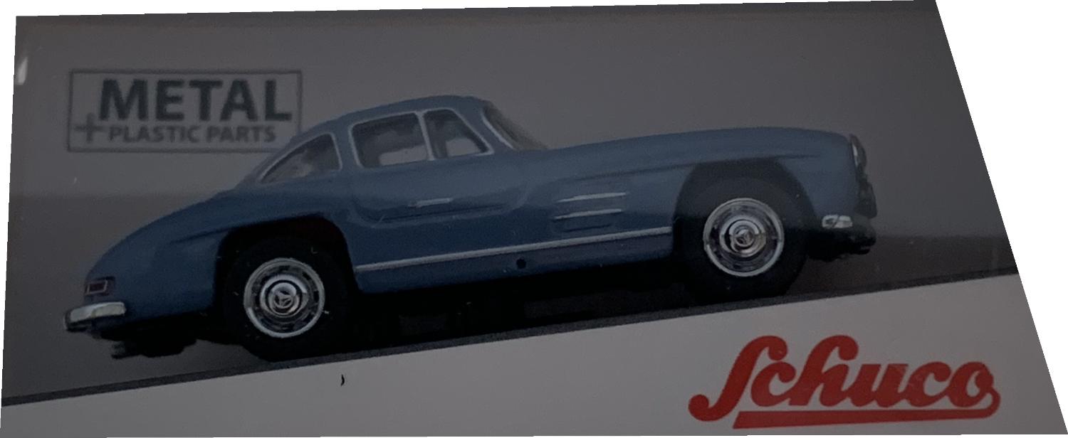 An excellent scale model of a Mercedes Benz 300 SL decorated in blue