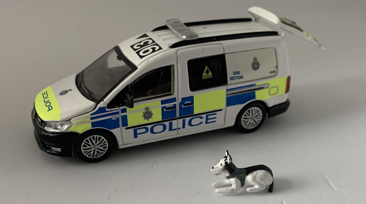 An excellent scale model of a VW Caddy Police Dog Unit decorated in authentic London Police livery