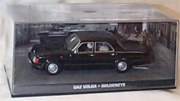 Gaz Volga from the James Bond film Goldeneye. Model is mounted on a removable plinth with a removable hard plastic cover with themed background and base