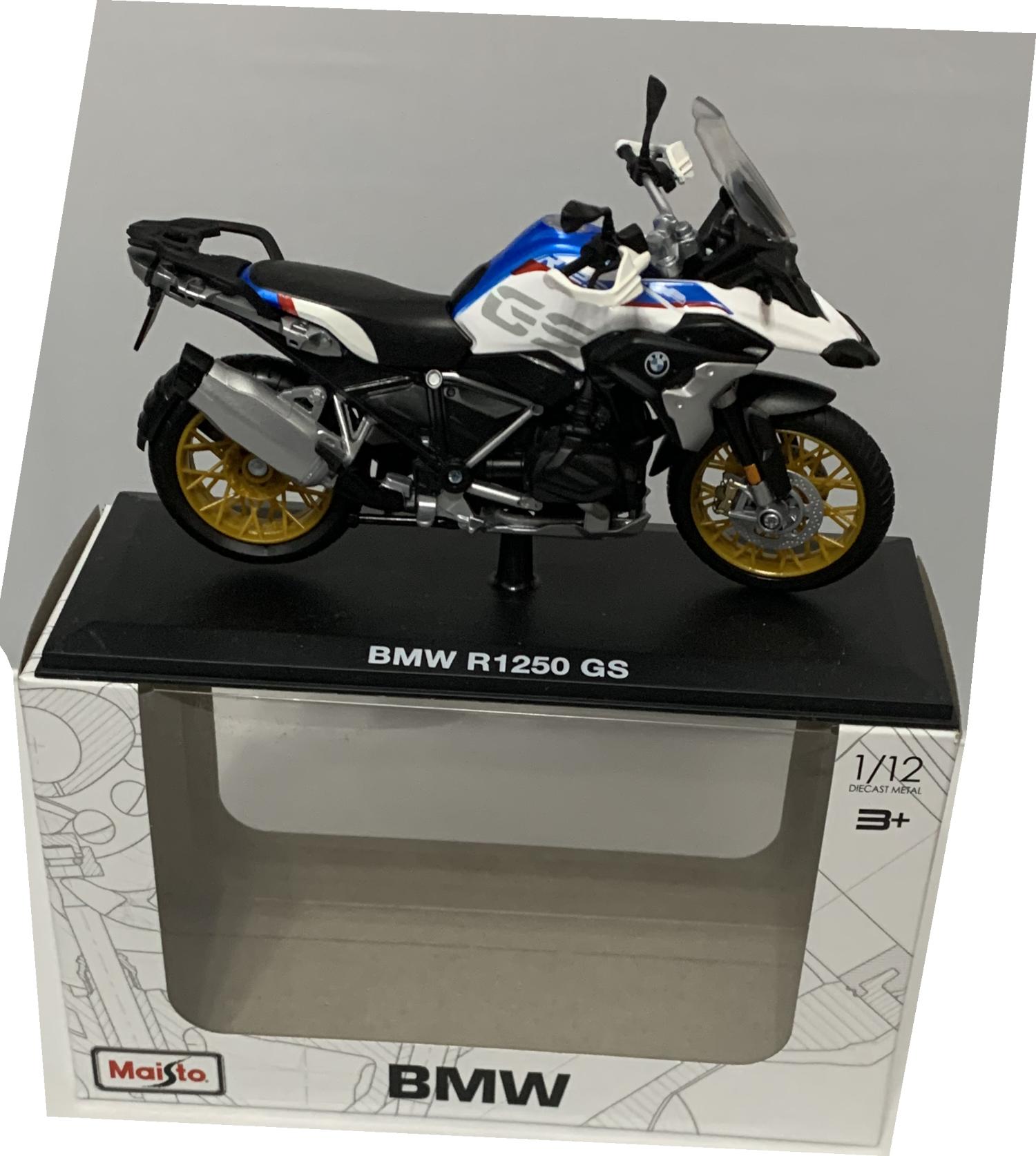 Scale: 1:12 Diecast Metal with Plastic Parts (approx length 18  cm), Model is mounted on a removable plinth and is presented in a window display box