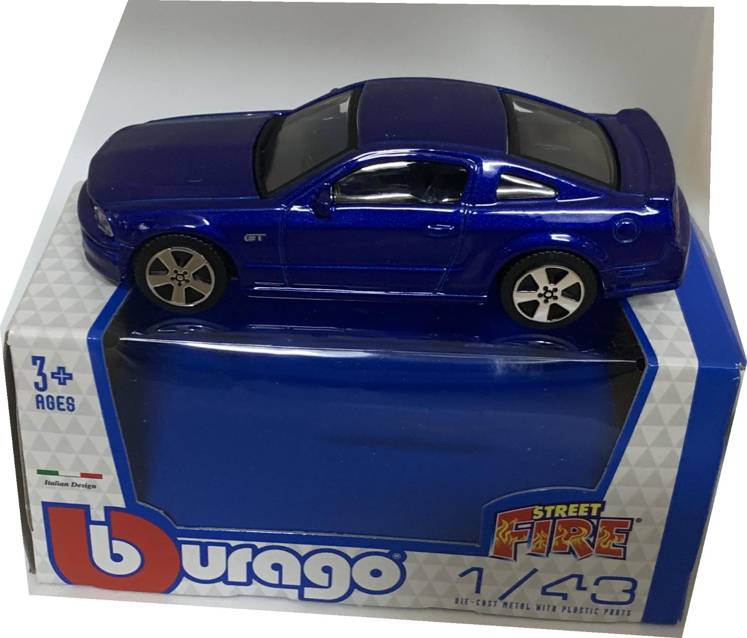 The Ford Mustang GT is decorated in blue with black interior.  Features working wheels, body coloured door handles, door mirrors and rear spoiler.  Model is presented in a window display box