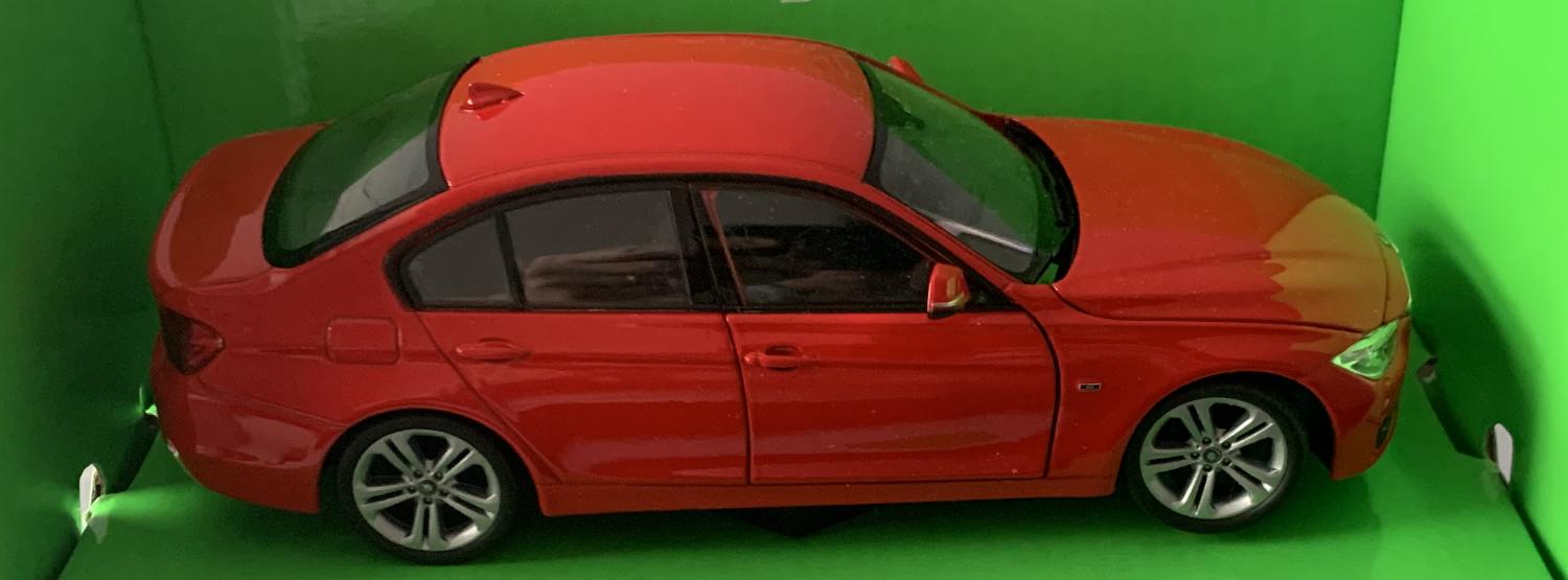 BMW 335i sport saloon, 2012 in red 1:24 scale diecast  model from Welly