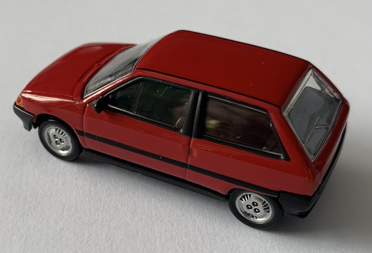 Citroen AX 1986 in red 1:64 scale model car from Norev, 310920, approx 5.5cm long