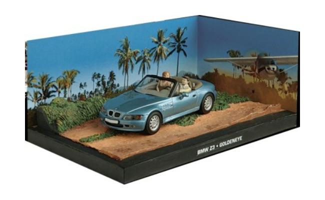 BMW Z3 from the James Bond film Goldeneye.  Model is mounted on a removable plinth with a removable hard plastic cover with themed background and base