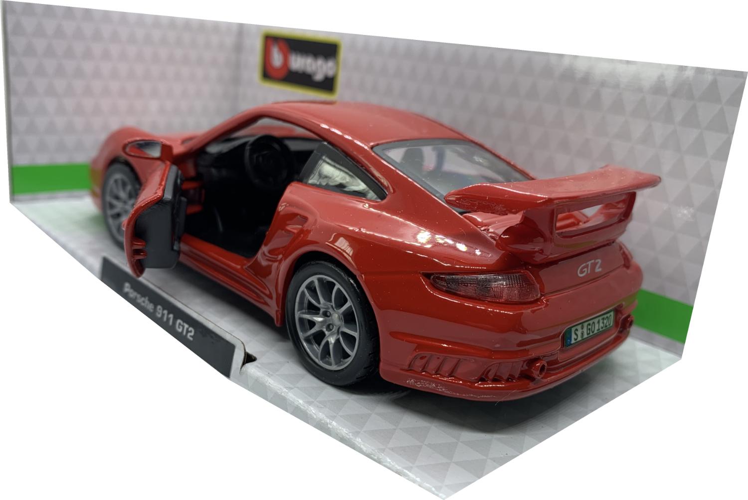 The Porsche 911 GT2 is decorated in red with high rear spoiler and silver wheels.  Other trims are finished in black and silver.  Features include opening driver and passenger door with working wheels