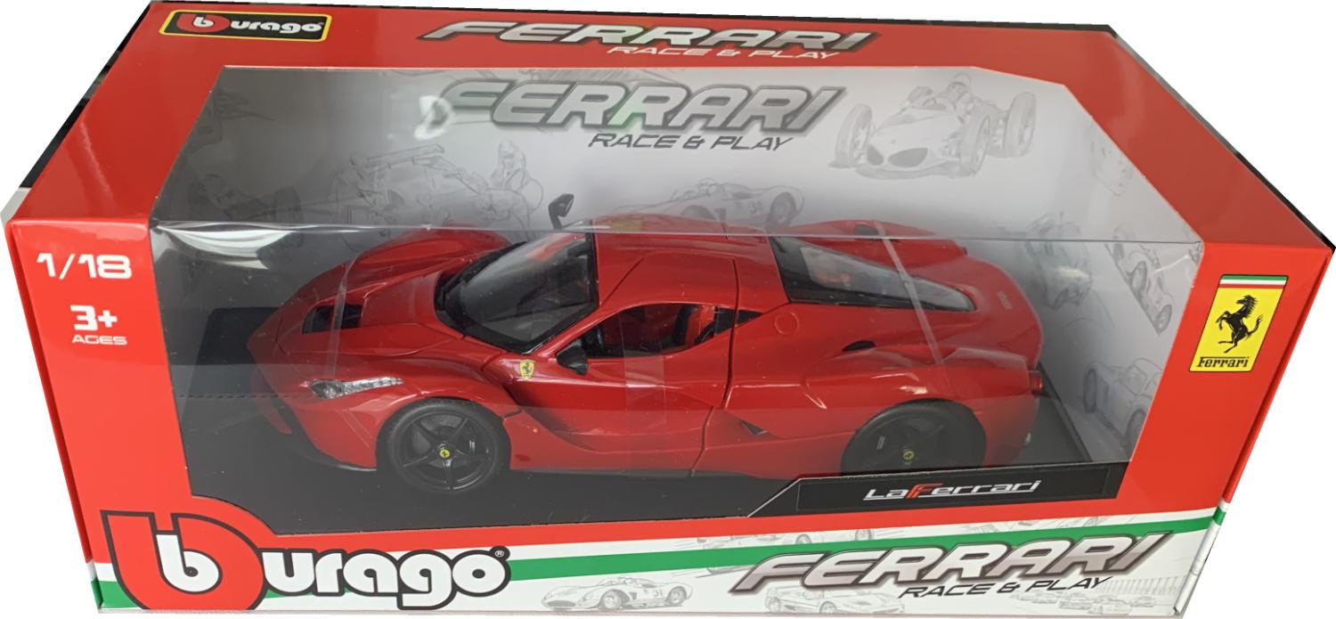 Model is an official licensed product presented on a removable plinth in a Ferrari window display box