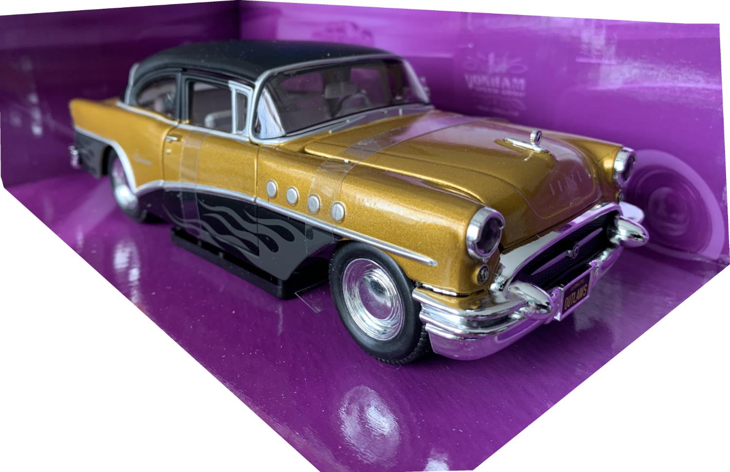 An excellent scale model of a Buick Century decorated in gold and black with opening driver and passenger doors, opening bonnet and working wheels.