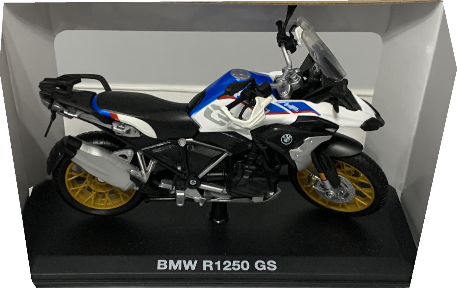 A good scale model of a BMW R1250 GS decorated in grey, white and blue with authentic graphics.