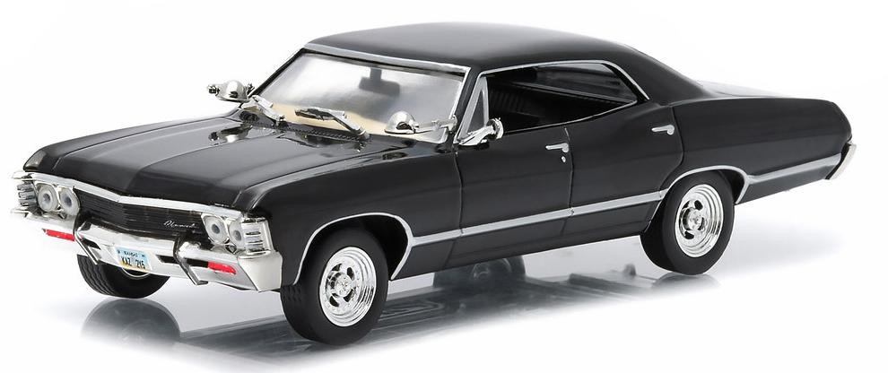 n excellent scale model of a Chevrolet Impala Sport Sedan decorated in black with silver wheels