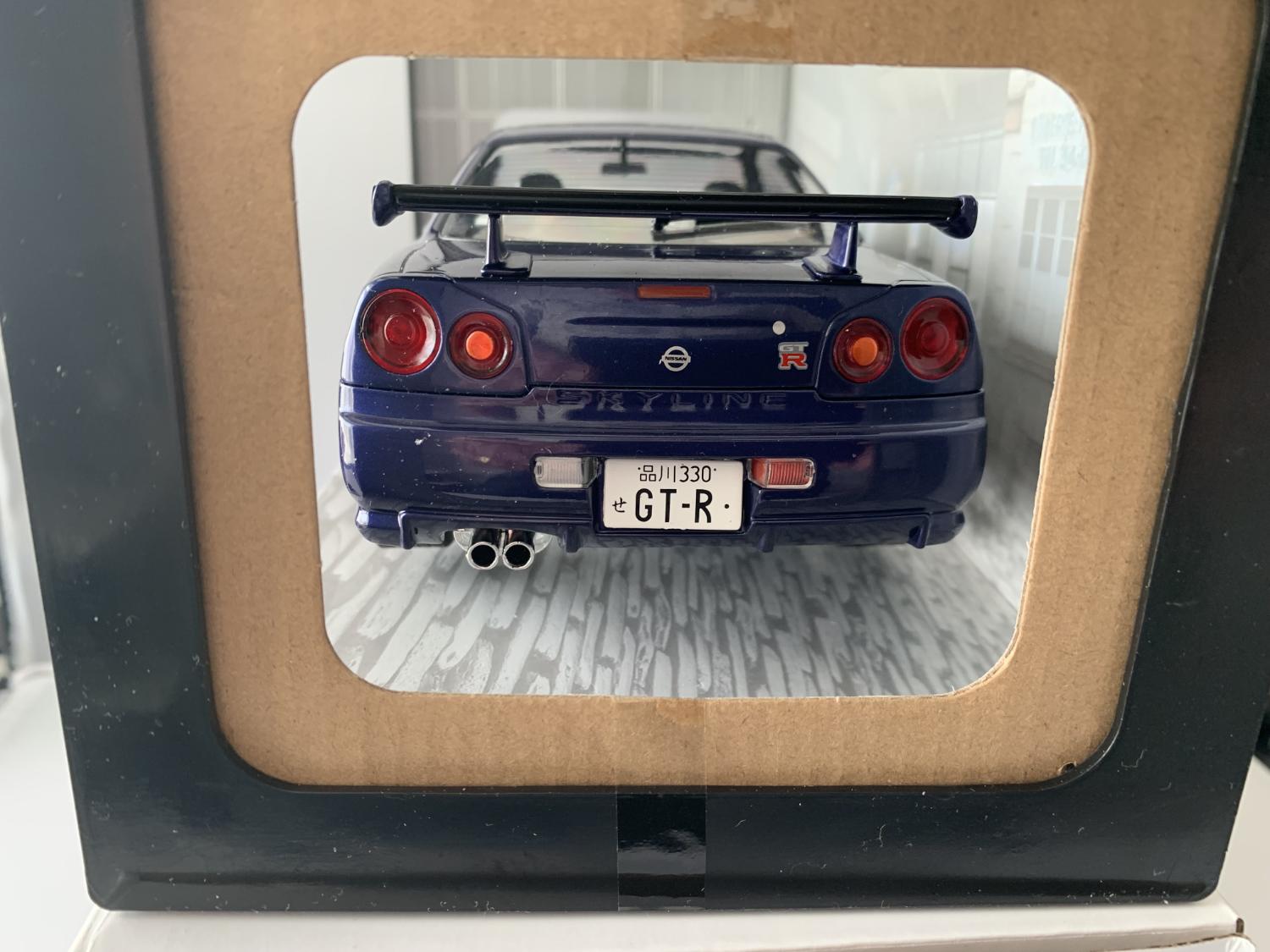 Nissan Skyline GT-R (34) 1999 in midnight purple 1:18 scale model from Solido