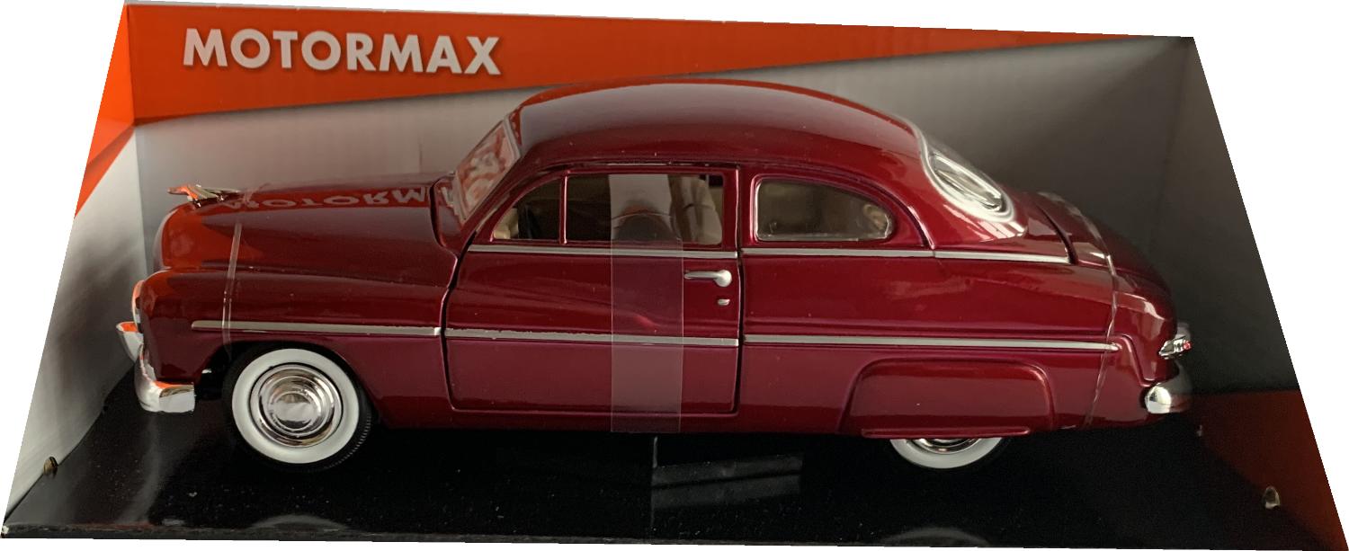 An excellent scale model of a Mercury Coupe decorated in metallic red with chrome wheels and white wall tyres