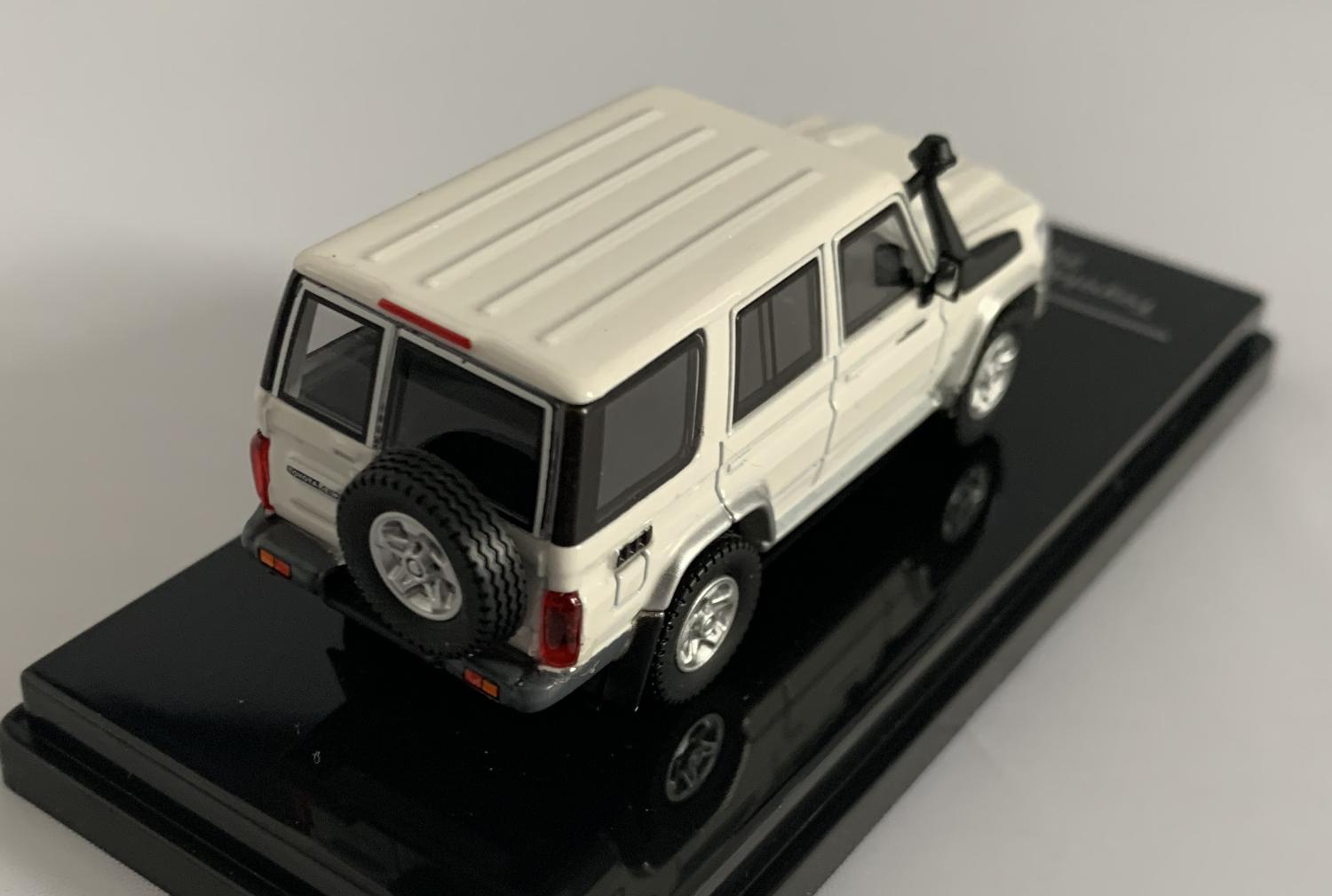 Toyota Land Cruiser in french vanilla 1:64 scale model from Paragon Models
