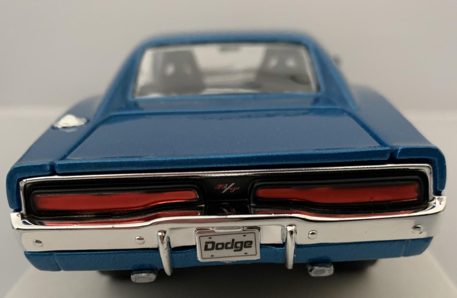 An excellent scale model of a Dodge Charger R/T decorated in bright blue with authentic graphics and silver wheels.  Features opening driver and passenger doors