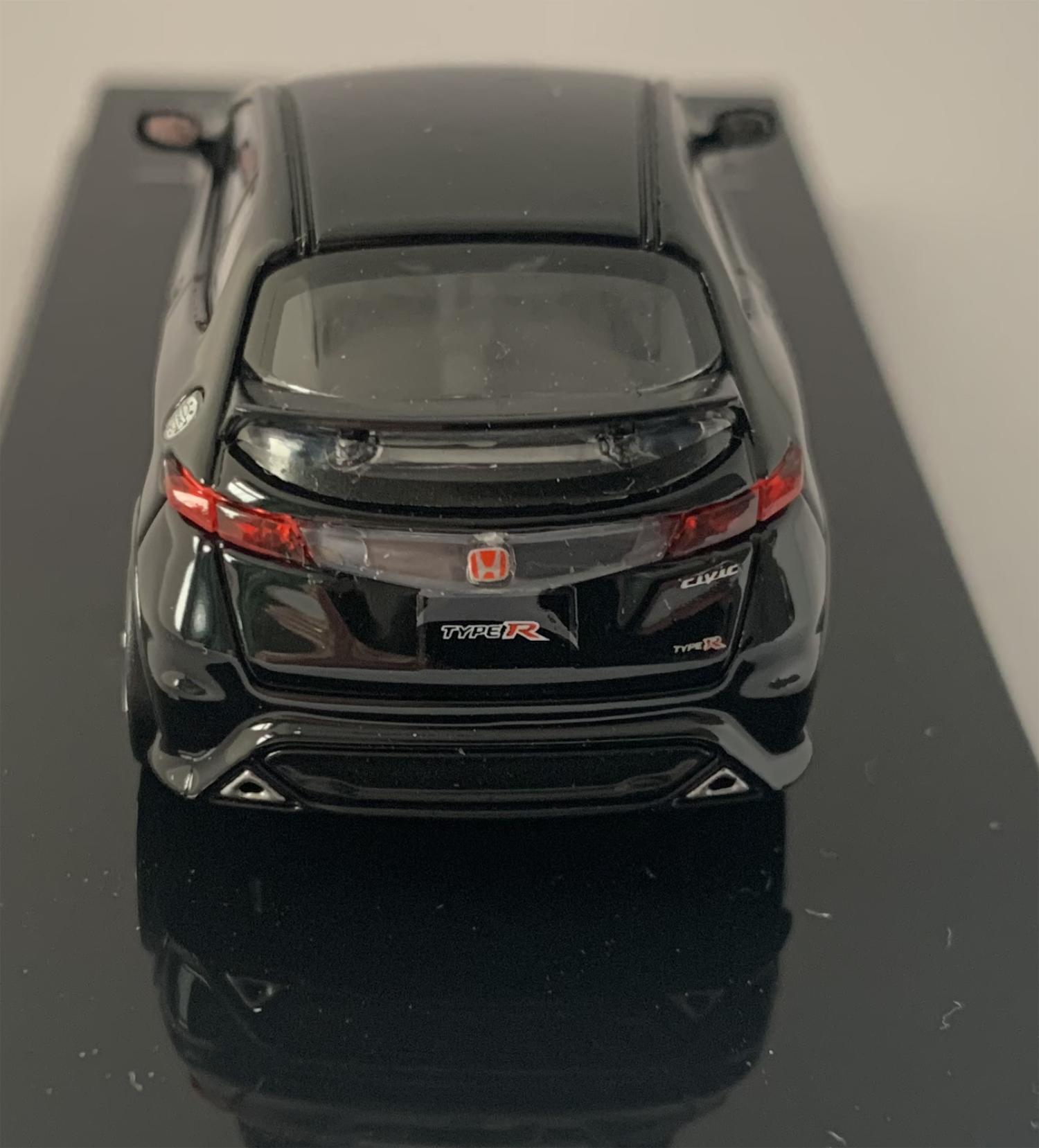 An excellent scale model of a 2007 Honda Civic Type R FN2 Euro is decorated in nighthawk black with high rear spoiler