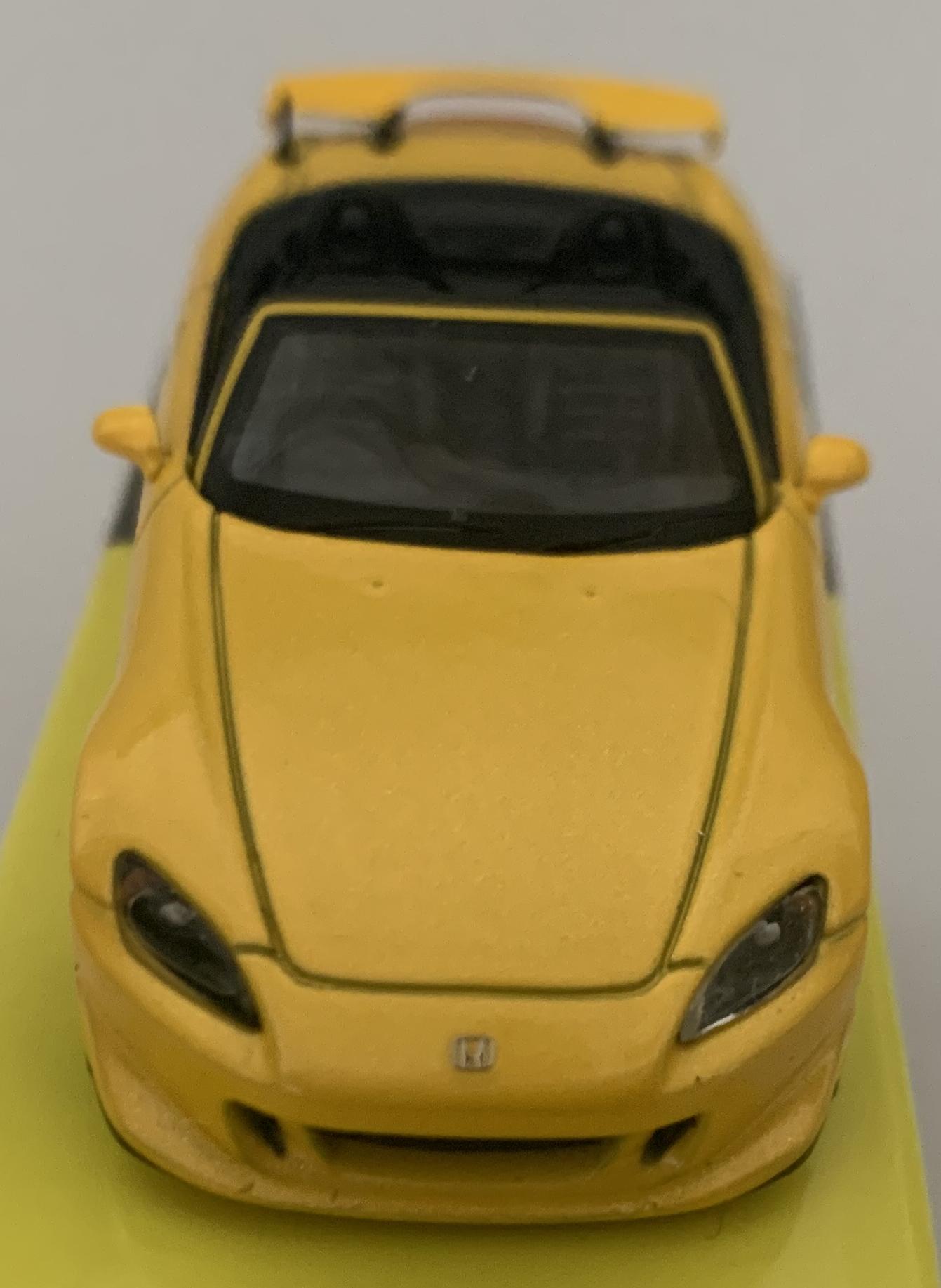 An excellent scale model of a Honda S2000 Type S decorated in indy yellow pearl and silver wheels.  Other trims are finished in black and silver