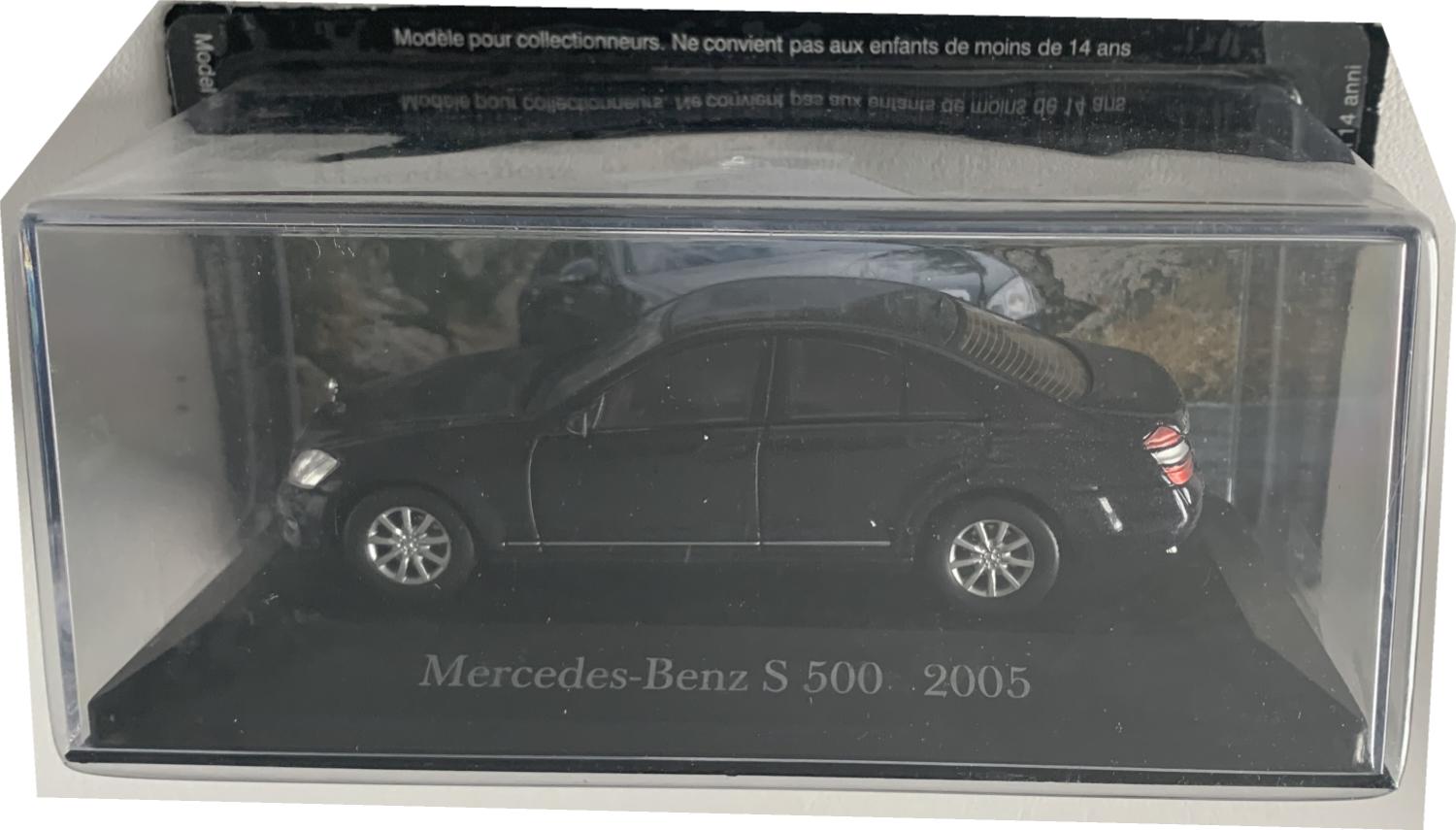 Mercedes Benz S 500 (W221) 2005 in dark blue 1:43 scale model Car.  The model is presented on a removable plinth with a removable  hard plastic cover