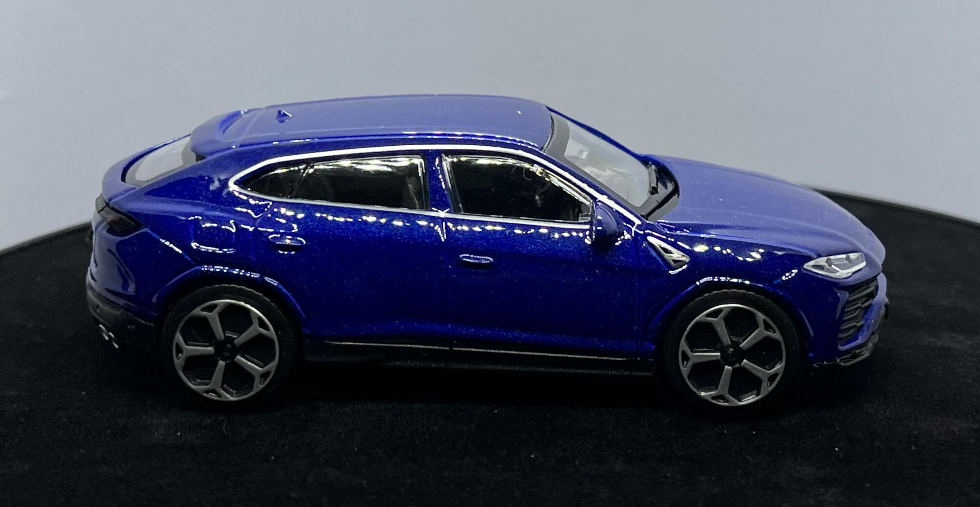 Urus in metallic blue 143 scale diecast car model from