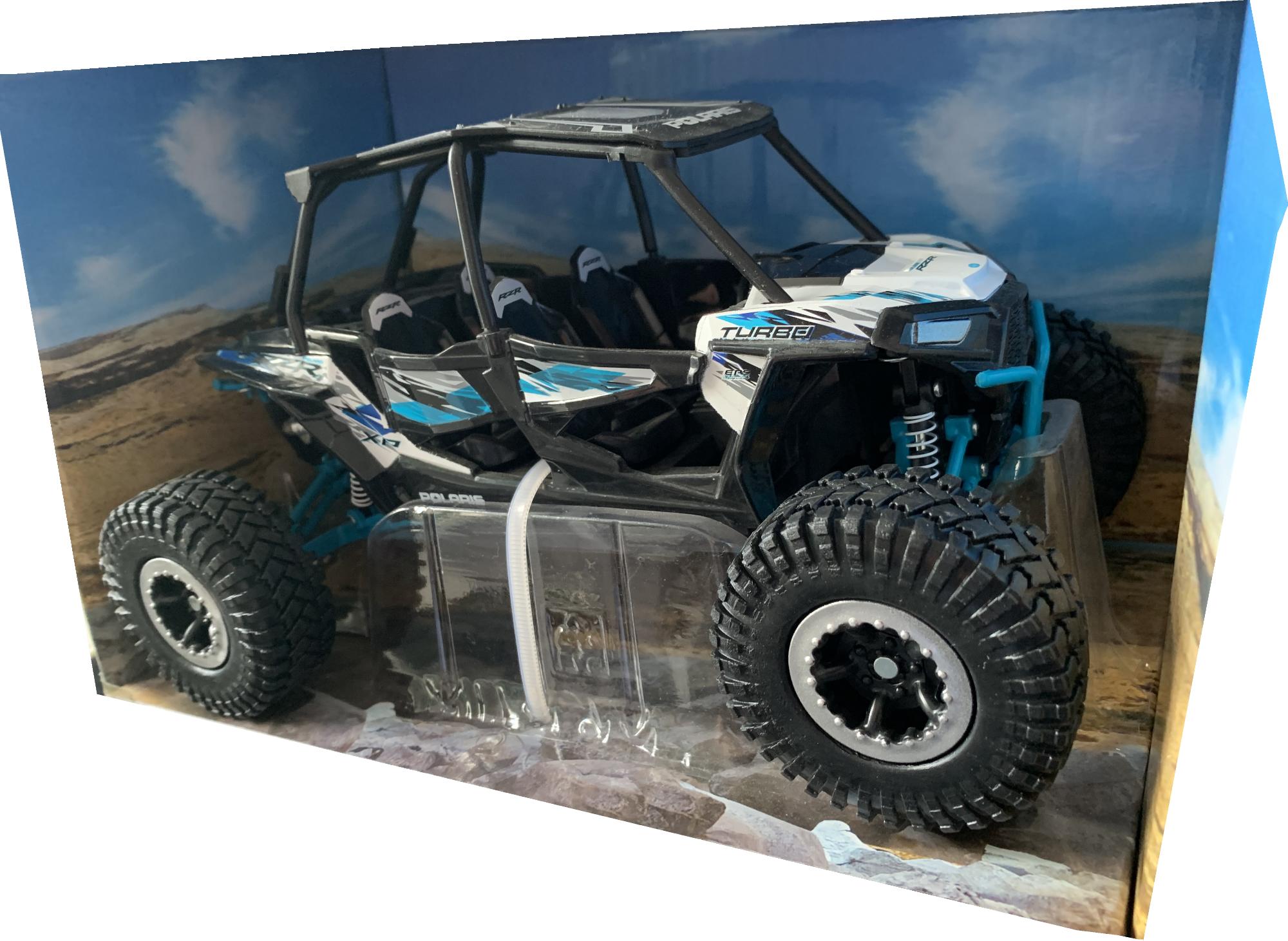 scale model of a Polaris RZR XP Turbo EPS Xtreme Off Road decorated in white lightning with authentic graphics, real looking wheels and tread.  Other trims are finished in silver and blue.  Features include working wheels and suspension.