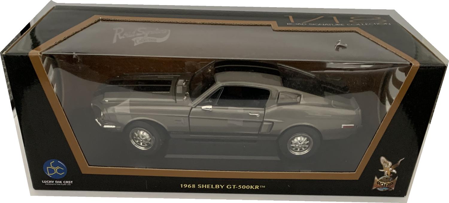 An excellent scale model of the Shelby GT-500KR with high level of detail throughout, all authentically recreated.  Model is presented on a removeable plinth in a window display box. The car is approx. 26 cm long and the presentation box is 5.5 cm long