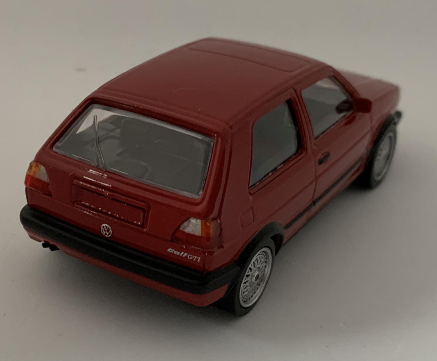 A good replica of the VW Golf GTI decorated in red with silver wheels.