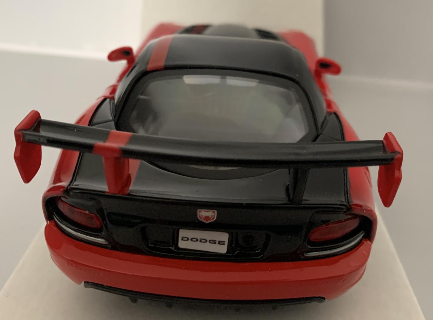 he Dodge Viper SRT 10 ACR is decorated in red and black with authentic graphics
