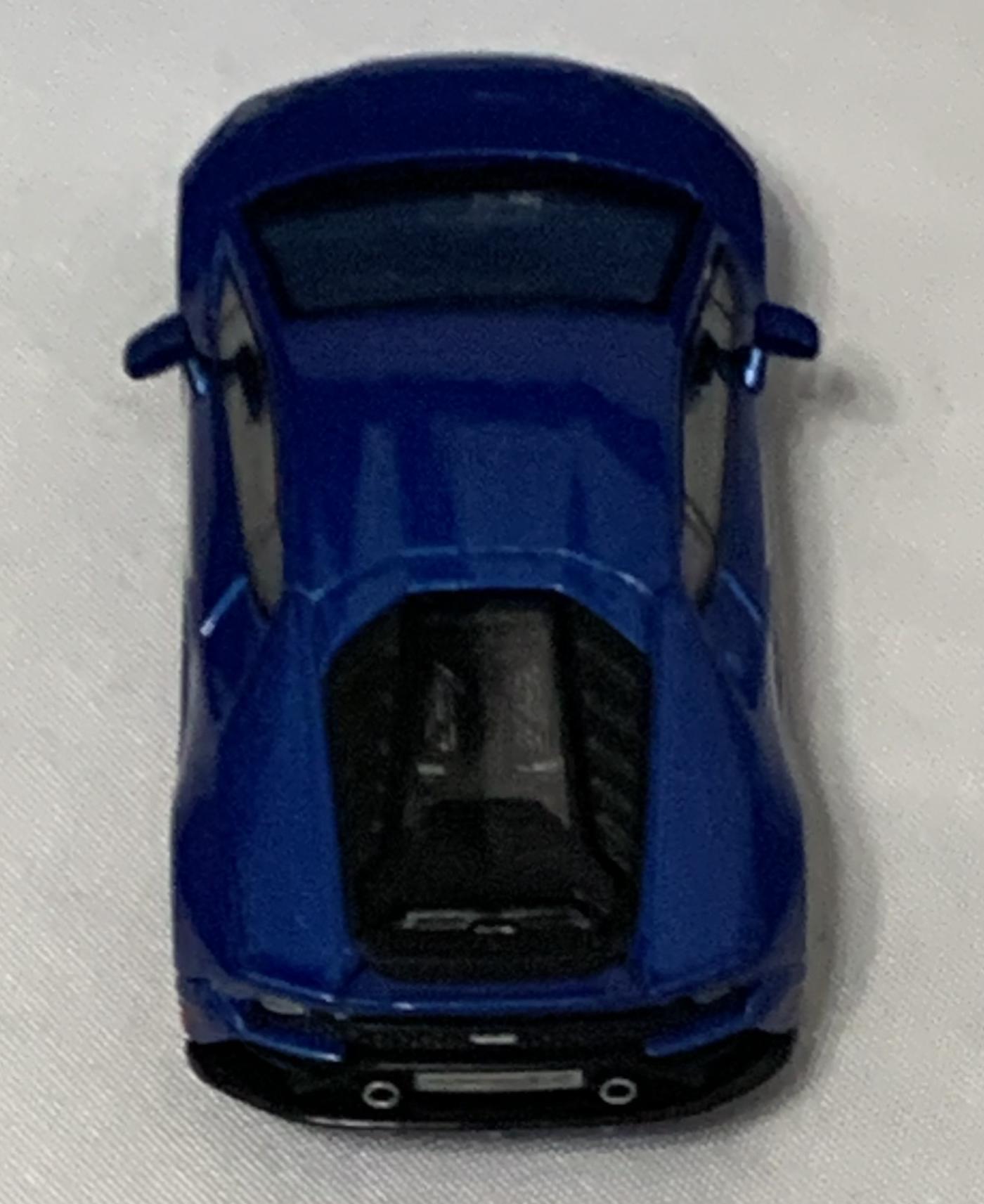 An excellent scale model of a Lamborghini Huracan EVO decorated in blue eleos with silver wheels