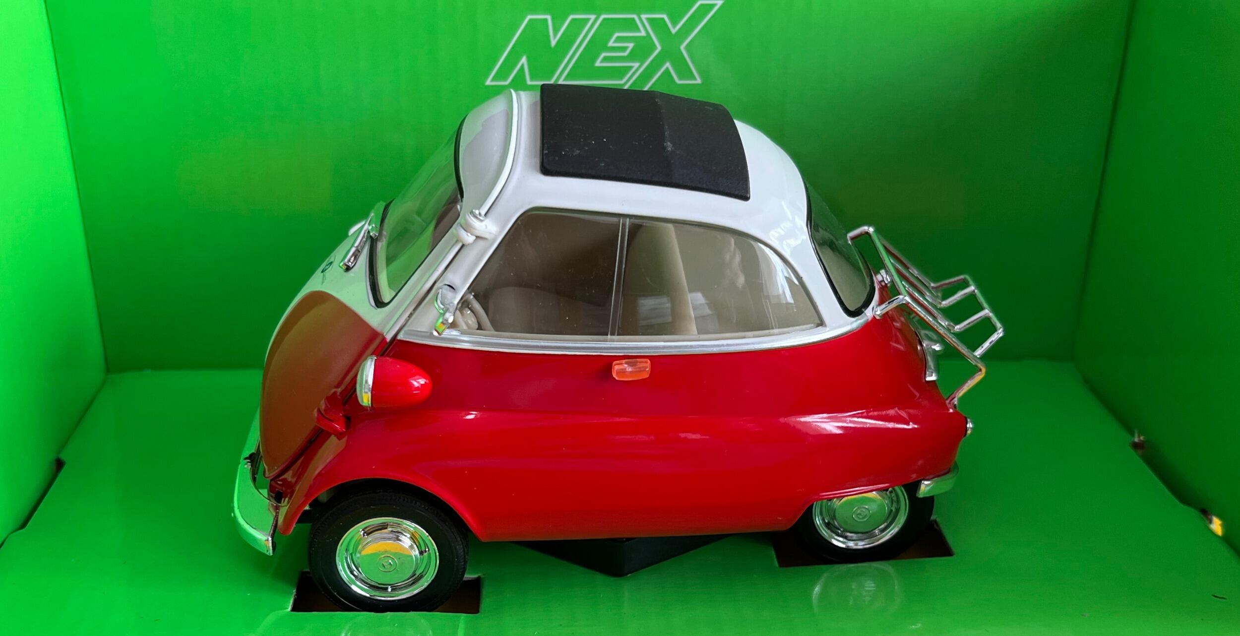 An excellent scale model of a BMW Isetta 250 decorated in red and white with black and white roof and chrome wheels. Other trims are finished in chrome and black.