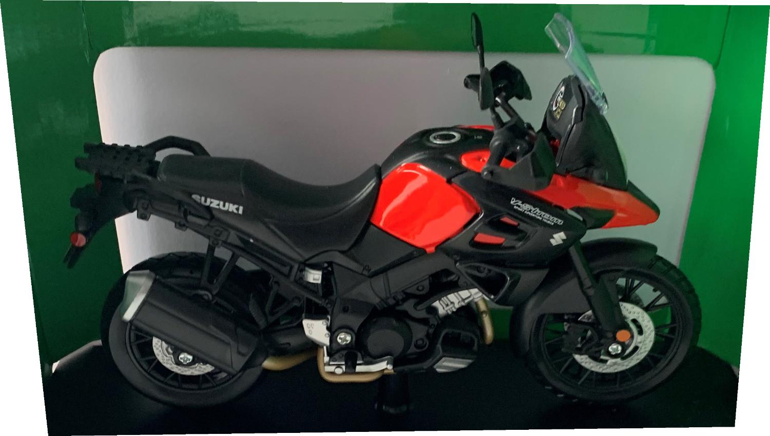 Suzuki V-Strom 1000 in red / black 1:12 scale model from Maisto, mounted on a plinth and presented in a green Suzuki themed box