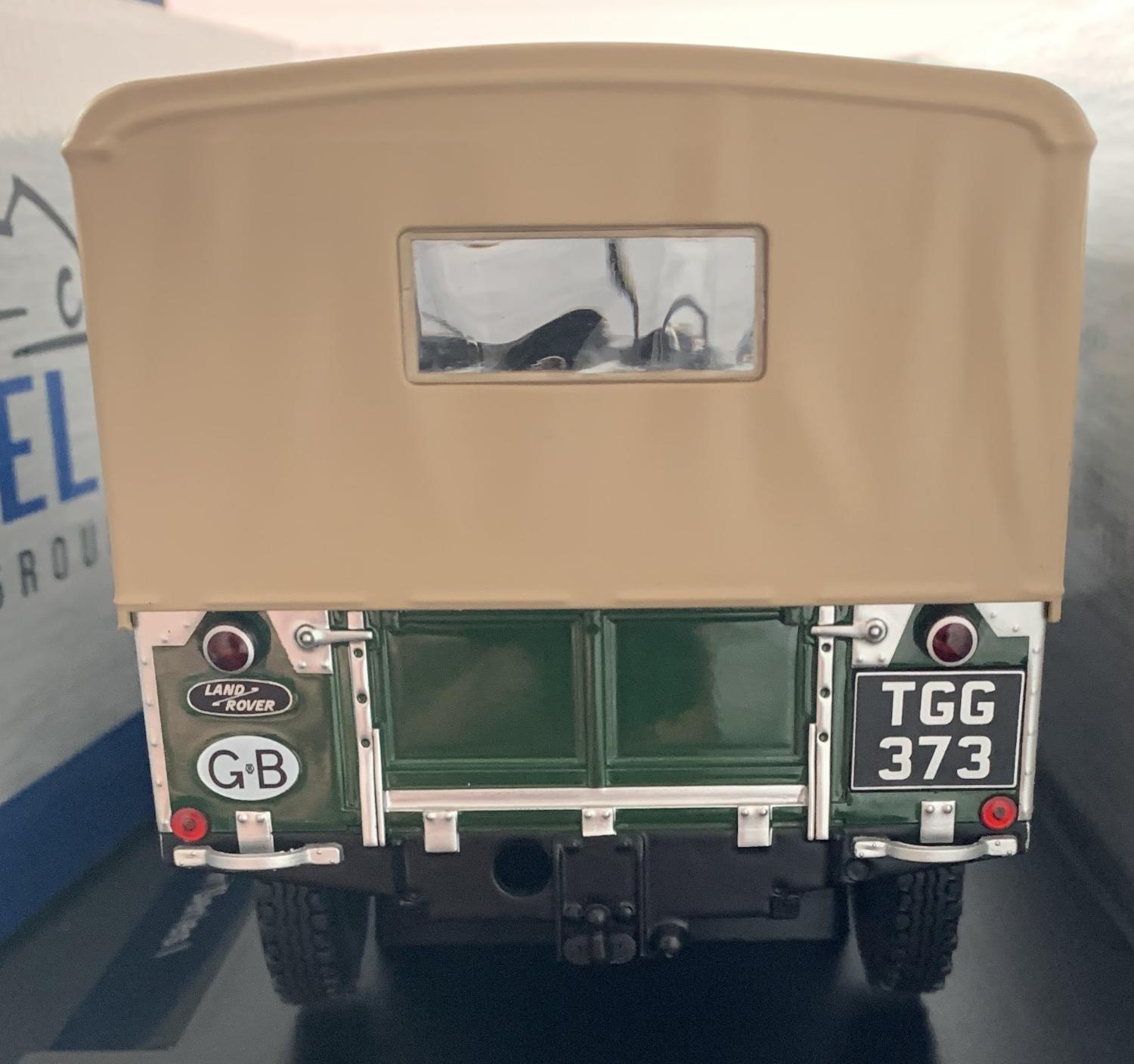 A very good representation of the Land Rover Series 1 Closed decorated in dark green with beige canvas effect roof and sides with dark green wheels.