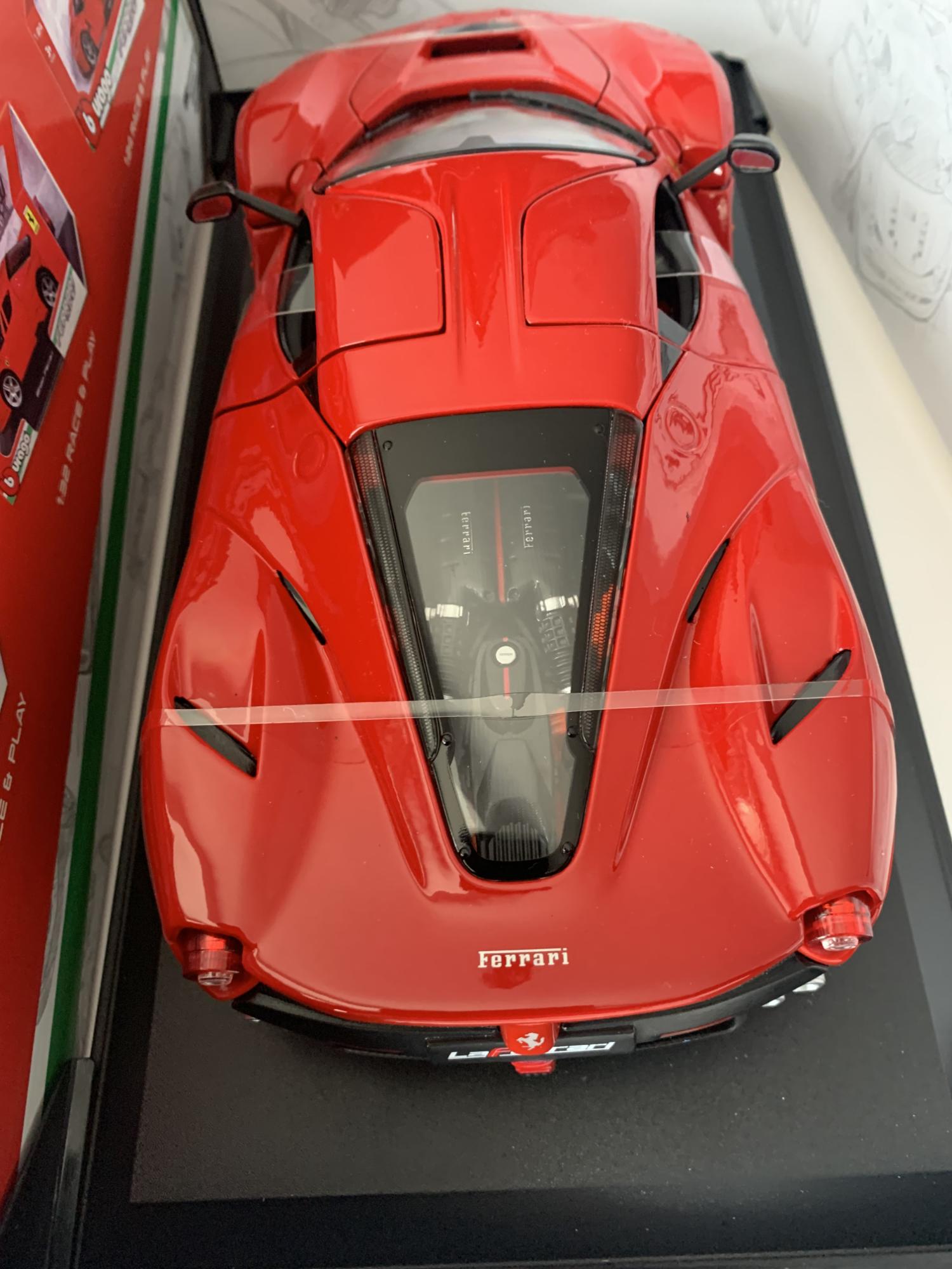 A very good representation of the Ferrari La Ferrari decorated in red with black Wheels